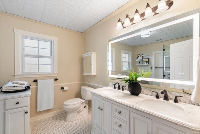 2206 Newfield Ln, Austin, TX 78703 - full bath with double vanity and tile patterned flooring