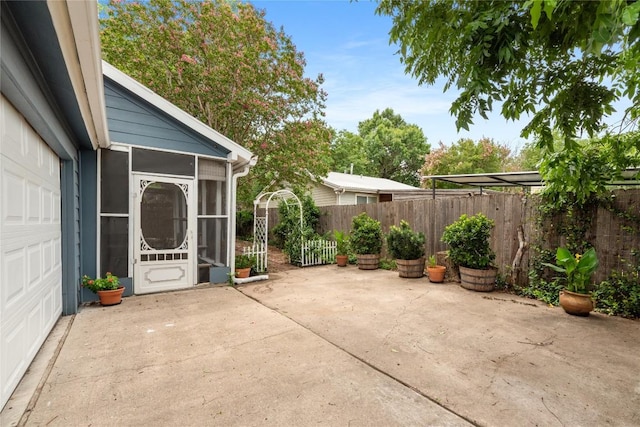 2206 Newfield Ln, Austin, TX 78703 - view of patio featuring a sunroom