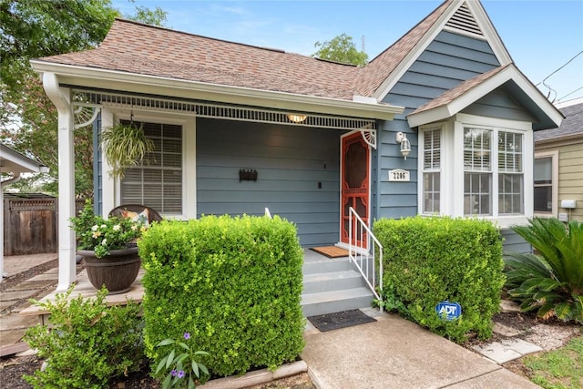 2206 Newfield Ln, Austin, TX 78703 - view of exterior entry with a shingled roof