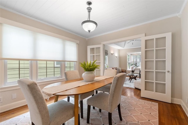 2206 Newfield Ln, Austin, TX 78703 - dining room featuring light wood-style flooring and ornamental molding