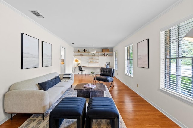 7710 Shoal Creek Blvd, Austin, TX 78757 - living area with wood finished floors and crown molding