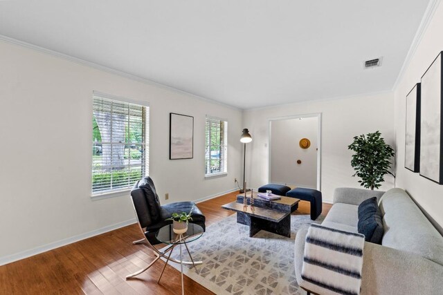 7710 Shoal Creek Blvd, Austin, TX 78757 - living area with plenty of natural light, wood finished floors, and crown molding