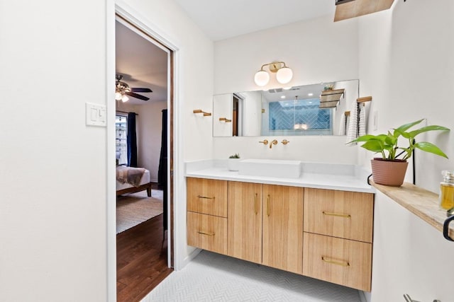 7710 Shoal Creek Blvd, Austin, TX 78757 - bathroom featuring ensuite bathroom, vanity, wood finished floors, and a shower