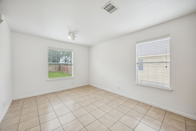 1444 Kenneys Way, Round Rock, TX 78665 - spare room featuring light tile patterned flooring