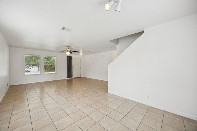 1444 Kenneys Way, Round Rock, TX 78665 - unfurnished living room with ceiling fan and light tile patterned floors