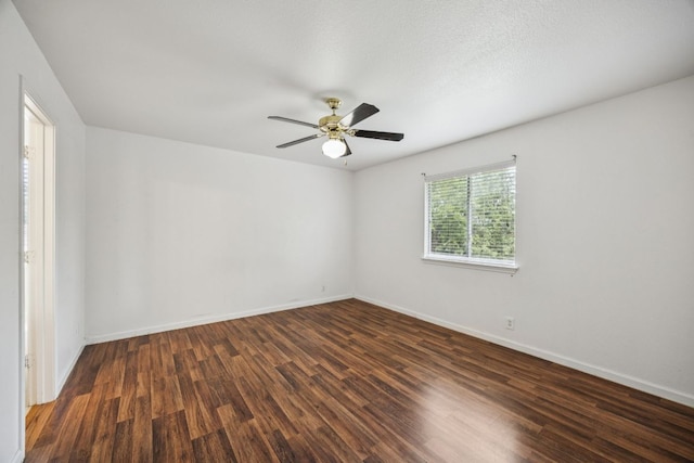 1444 Kenneys Way, Round Rock, TX 78665 - unfurnished room featuring dark wood-style flooring and a ceiling fan