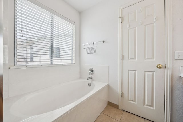 1444 Kenneys Way, Round Rock, TX 78665 - bathroom with a bath and tile patterned floors