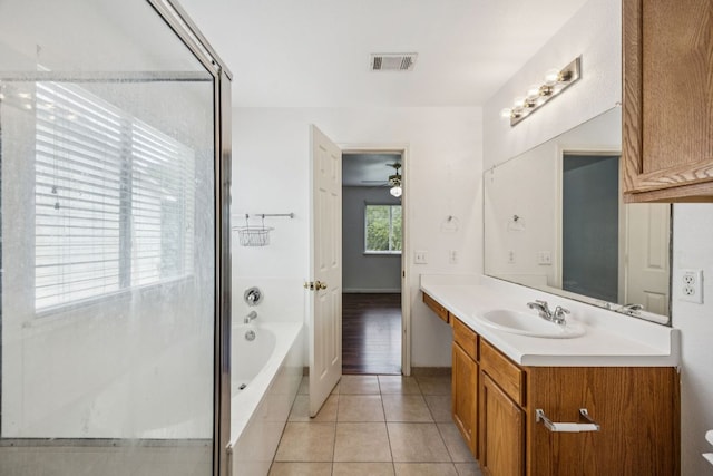 1444 Kenneys Way, Round Rock, TX 78665 - full bath featuring a bath, vanity, tile patterned floors, ceiling fan, and a shower