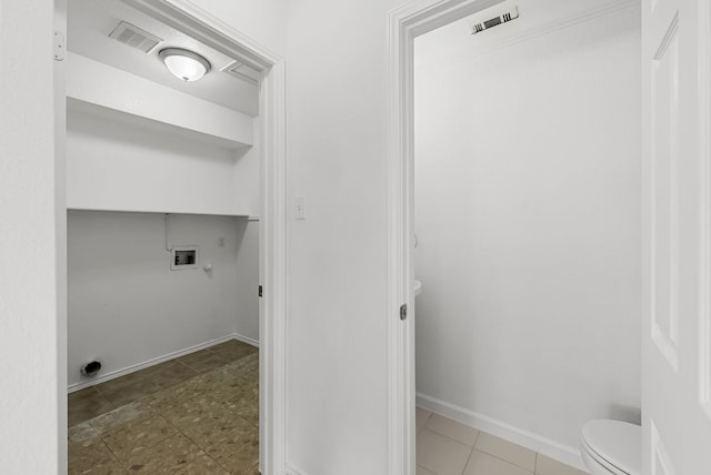 1213 Pathfinder Way, Round Rock, TX 78665 - laundry area featuring hookup for a washing machine, tile patterned floors, and hookup for an electric dryer