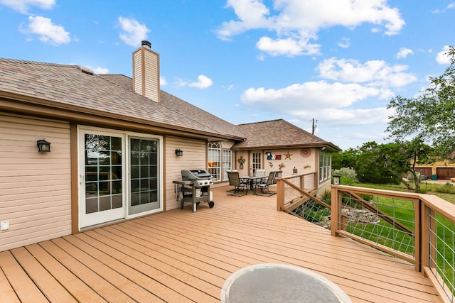 1011 Windmill Rd, Dripping Springs, TX 78620 - deck with outdoor dining area and area for grilling