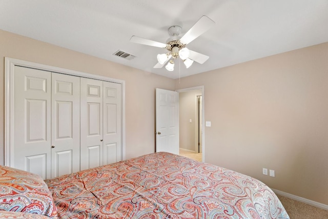 1011 Windmill Rd, Dripping Springs, TX 78620 - carpeted bedroom featuring a closet and a ceiling fan
