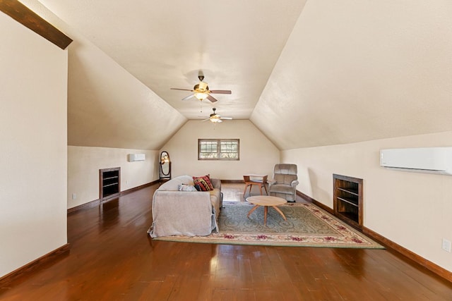 1011 Windmill Rd, Dripping Springs, TX 78620 - living area with a wall mounted air conditioner, wood-type flooring, vaulted ceiling, and ceiling fan