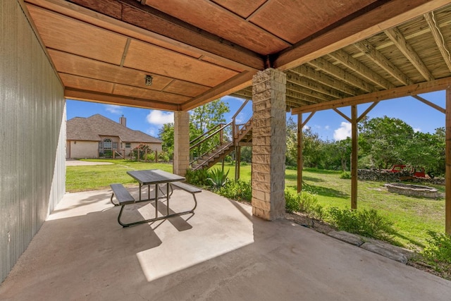 1011 Windmill Rd, Dripping Springs, TX 78620 - view of patio featuring stairway