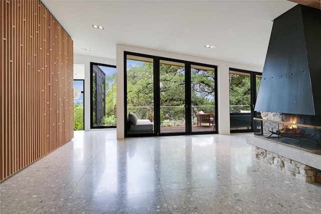 1900 Airole Way, Austin, TX 78704 - unfurnished living room featuring a multi sided fireplace
