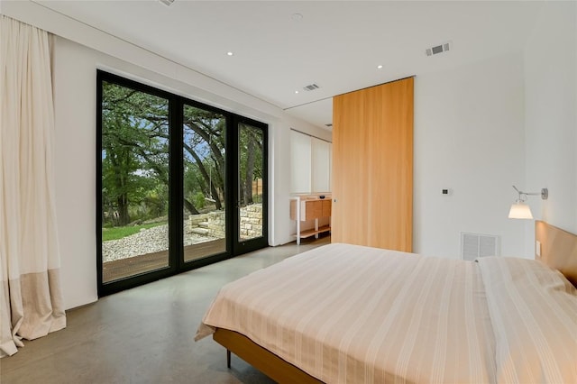 1900 Airole Way, Austin, TX 78704 - bedroom with access to exterior, finished concrete floors, and recessed lighting