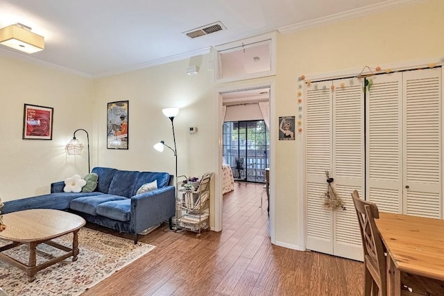 303 W 35th St Unit 202, Austin, TX 78705 - living area with wood finished floors and crown molding