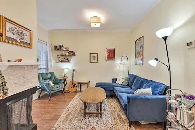 303 W 35th St Unit 202, Austin, TX 78705 - living room with ornamental molding, wood finished floors, and a multi sided fireplace
