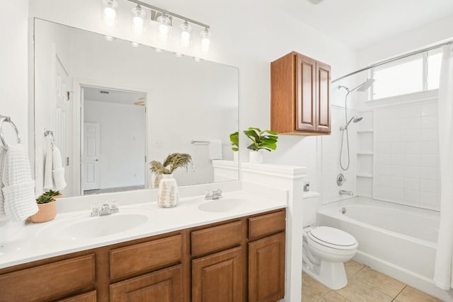 141 Ashwood N, Kyle, TX 78640 - bathroom featuring double vanity, tile patterned flooring, and shower / bath combination