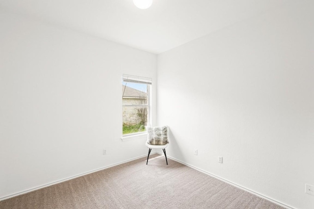 141 Ashwood N, Kyle, TX 78640 - carpeted spare room with baseboards