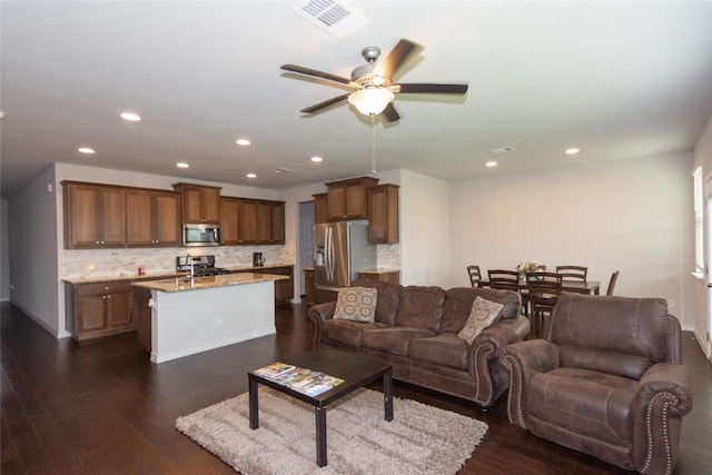 6007 Agostino Cv, Round Rock, TX 78665 - living area with a ceiling fan, recessed lighting, and dark wood finished floors