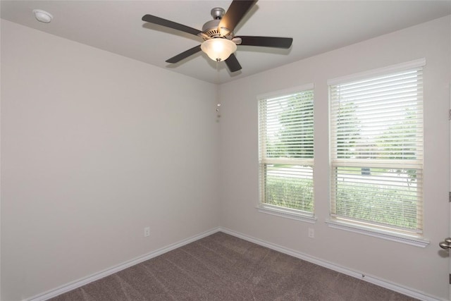 6007 Agostino Cv, Round Rock, TX 78665 - unfurnished room featuring a ceiling fan, dark carpet, and a smoke detector