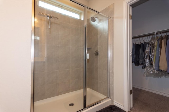 6007 Agostino Cv, Round Rock, TX 78665 - full bathroom with a shower stall and a walk in closet