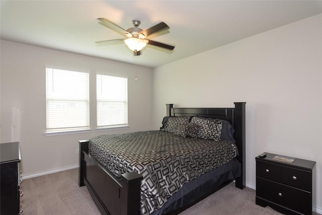 6007 Agostino Cv, Round Rock, TX 78665 - carpeted bedroom with baseboards and a ceiling fan