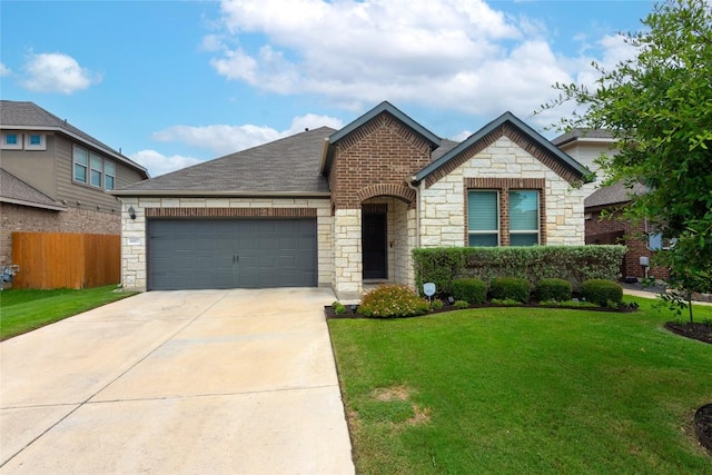 6007 Agostino Cv, Round Rock, TX 78665 - french country style house with stone siding, an attached garage, driveway, and roof with shingles