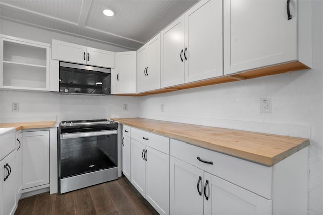 1216 Jones St, Taylor, TX 76574 - kitchen with stainless steel electric range oven, wooden counters, dark wood-type flooring, white cabinetry, and open shelves