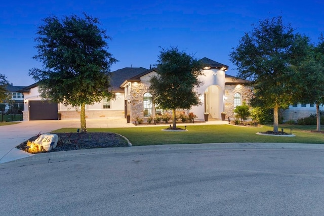 1720 Boscello Ct, Leander, TX 78641 - view of front of home featuring stone siding, concrete driveway, and a front yard