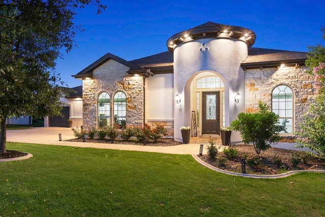 1720 Boscello Ct, Leander, TX 78641 - view of front of house featuring stone siding, a front yard, stucco siding, and a garage