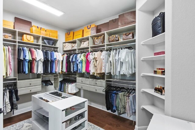 1720 Boscello Ct, Leander, TX 78641 - spacious closet featuring dark wood-style floors