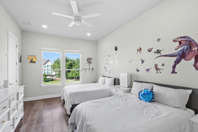 1720 Boscello Ct, Leander, TX 78641 - bedroom featuring dark wood finished floors, a ceiling fan, and recessed lighting
