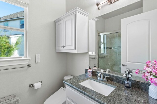 1720 Boscello Ct, Leander, TX 78641 - bathroom with healthy amount of natural light, a shower stall, and vanity