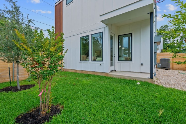 54 Robert T Martinez Jr St, Austin, TX 78702 - view of side of home with board and batten siding