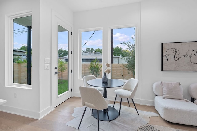 54 Robert T Martinez Jr St, Austin, TX 78702 - dining room featuring light wood-style floors