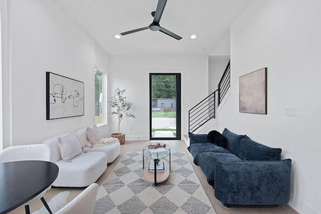 54 Robert T Martinez Jr St, Austin, TX 78702 - living area with recessed lighting, a ceiling fan, stairway, and light wood-style flooring