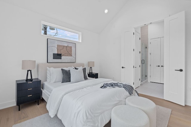 54 Robert T Martinez Jr St, Austin, TX 78702 - bedroom featuring light wood-style flooring, lofted ceiling, and recessed lighting