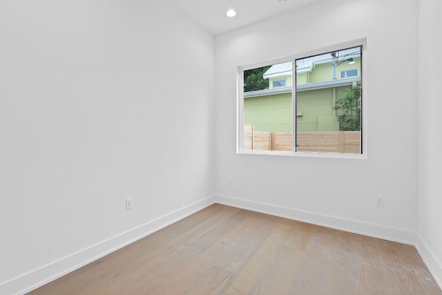 54 Robert T Martinez Jr St, Austin, TX 78702 - spare room with wood finished floors and recessed lighting