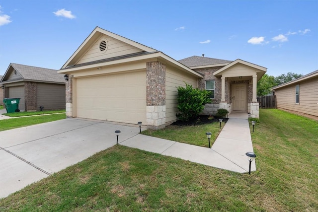 3402 Tilmon Ln, Austin, TX 78725 - view of front of house featuring brick siding, a front yard, and an attached garage