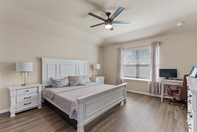 3402 Tilmon Ln, Austin, TX 78725 - bedroom featuring wood finished floors, a desk, a ceiling fan, and lofted ceiling