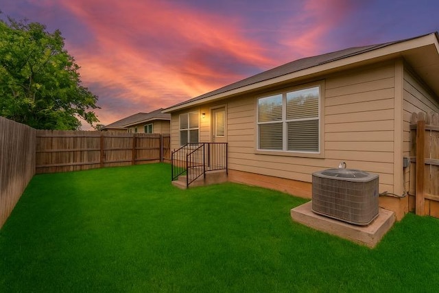 3402 Tilmon Ln, Austin, TX 78725 - back of property at dusk featuring a fenced backyard