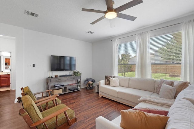 4201 Veiled Falls Dr, Pflugerville, TX 78660 - living room with ceiling fan and dark wood-type flooring