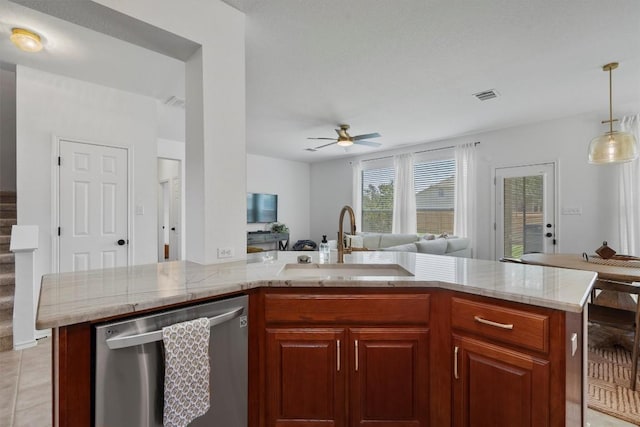 4201 Veiled Falls Dr, Pflugerville, TX 78660 - kitchen with dishwasher, open floor plan, a ceiling fan, beverage cooler, and pendant lighting