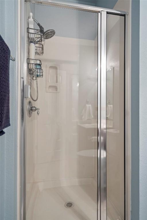 4201 Veiled Falls Dr, Pflugerville, TX 78660 - bathroom featuring a shower stall