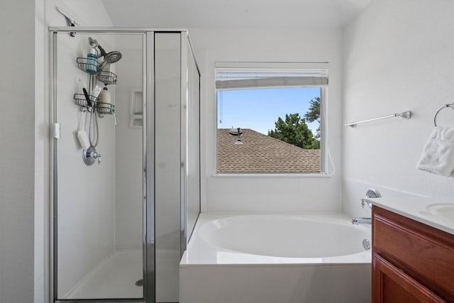 4201 Veiled Falls Dr, Pflugerville, TX 78660 - bathroom with a shower stall, a garden tub, and vanity