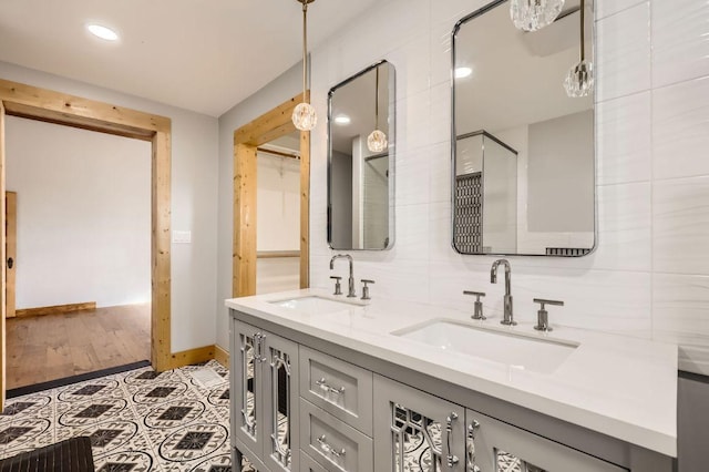 3701 Fm 972, Georgetown, TX 78626 - full bathroom featuring double vanity, recessed lighting, and decorative backsplash