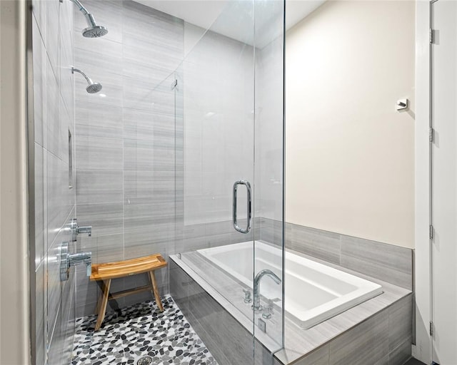 5921 Hiline Rd Unit 2404, Austin, TX 78734 - bathroom featuring tiled tub and tiled shower