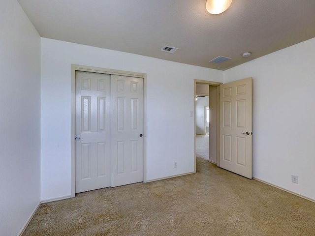 11509 Timber Heights Dr, Austin, TX 78754 - unfurnished bedroom with carpet flooring and a closet