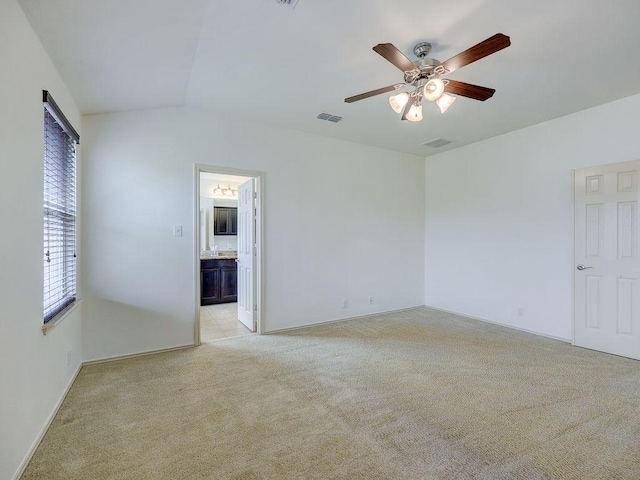 11509 Timber Heights Dr, Austin, TX 78754 - unfurnished room featuring light carpet, a ceiling fan, and lofted ceiling